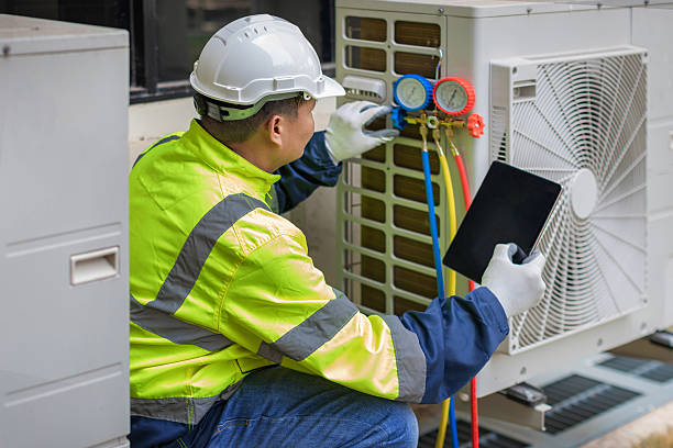 Professional Hvac technician working in Macon, IL